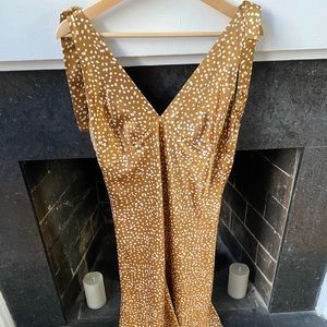 Lucy Paris spotted copper dress